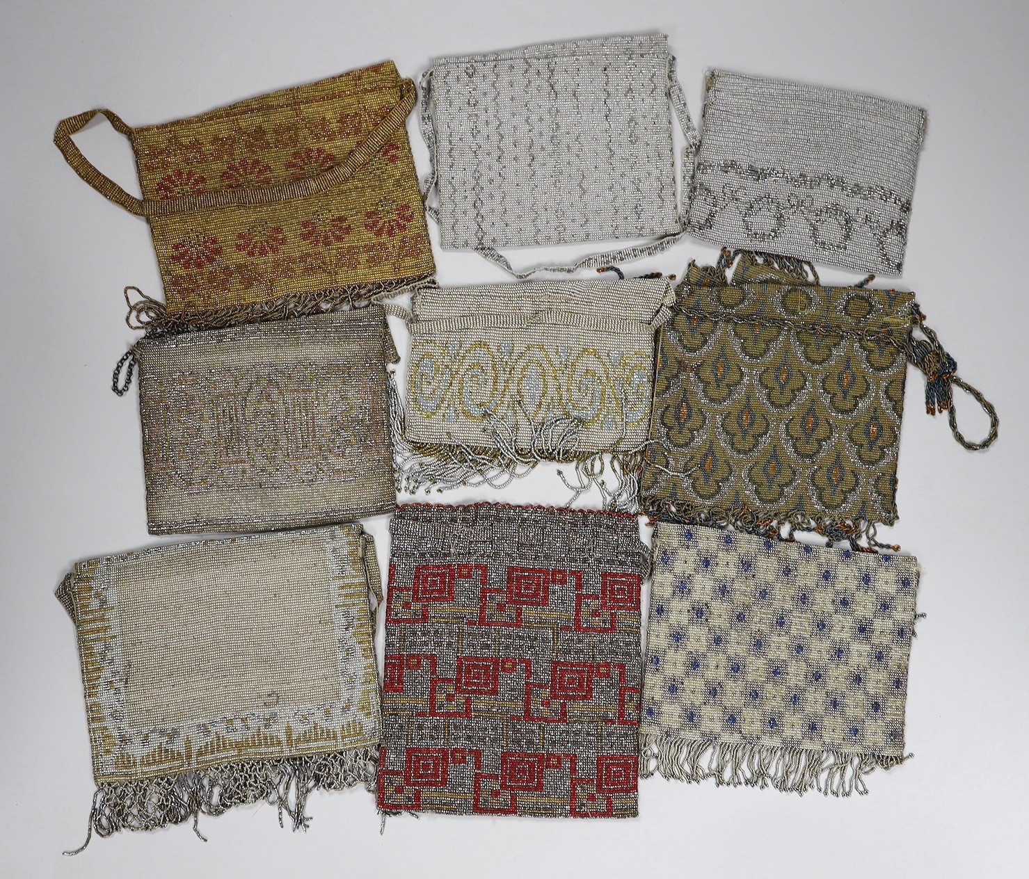 Nine coloured cut steel early 20th century ladies beaded evening bags